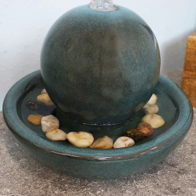 Sunnydaze Decor Sunnydaze Indoor Home Decorative Smooth Glazed Ceramic Orb Tabletop Water Fountain Feature - 7" - Green 6 Sunnydaze Decor Sunnydaze Indoor Home Decorative Smooth Glazed Ceramic Orb Tabletop Water Fountain Feature - 7" - Green - Image 4