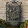 Sunnydaze Decor Sunnydaze 33"H Electric Polystone French Lily Design Outdoor Wall-Mount Water Fountain -Sunnydaze Decor GUEST 14ba3148 ffa9 4c5e a6a1 19bd40384c08