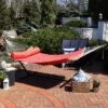 Sunnydaze Decor Sunnydaze Polyester Quilted Weave 2-Person Hammock With Curved Bamboo Spreader Bars - 450 Lb Weight Capacity - Salmon -Sunnydaze Decor GUEST 4a991446 ef68 4d6e 989d d7b19abb353a