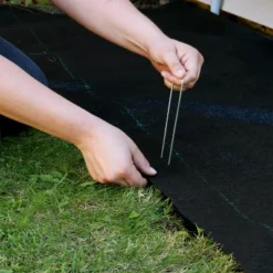 Sunnydaze Decor Sunnydaze UV Resistant Landscape Fabric Weed Barrier Fabric With Landscape Staples 19 Sunnydaze Decor Sunnydaze UV Resistant Landscape Fabric Weed Barrier Fabric With Landscape Staples -Sunnydaze Decor GUEST 7c270fef 1dd3 4f4b 9419 7027a0616c00