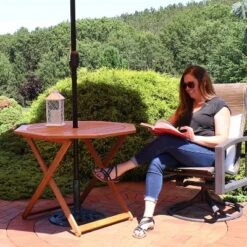 Sunnydaze Decor Sunnydaze Outdoor Meranti Wood With Teak Oil Finish Folding Octagon Patio Dining Table - 35" - Brown 13 Sunnydaze Decor Sunnydaze Outdoor Meranti Wood With Teak Oil Finish Folding Octagon Patio Dining Table - 35" - Brown -Sunnydaze Decor GUEST 91d95d77 c7ba 4720 8b5b 34cd4de51374