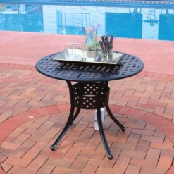 Sunnydaze Decor Sunnydaze Round Lattice Design Cast Aluminum Outdoor Patio Table With Umbrella Hole, Black 10 Sunnydaze Decor Sunnydaze Round Lattice Design Cast Aluminum Outdoor Patio Table With Umbrella Hole, Black -Sunnydaze Decor GUEST a3bdb0a3 72a4 40cb bc4a 50978c29cc9b