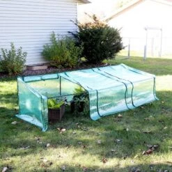 Sunnydaze Decor Sunnydaze Outdoor Portable Slanted Top Plant Shelter Mini Cloche Greenhouse With Zipper Doors - Green 14 Sunnydaze Decor Sunnydaze Outdoor Portable Slanted Top Plant Shelter Mini Cloche Greenhouse With Zipper Doors - Green -Sunnydaze Decor GUEST e54c3759 04be 4f7f 8784 076c28ffbe0c