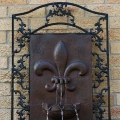 Sunnydaze Decor Sunnydaze 33"H Solar-Powered Polystone French Lily Design Outdoor Wall-Mount Water Fountain -Sunnydaze Decor GUEST eef7df93 c30c 4ebf 99d0 dfc824a05f8a